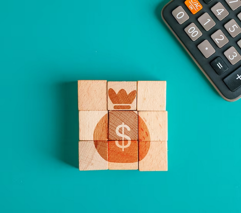 Wooden cubes arranged to create a coin sack image.